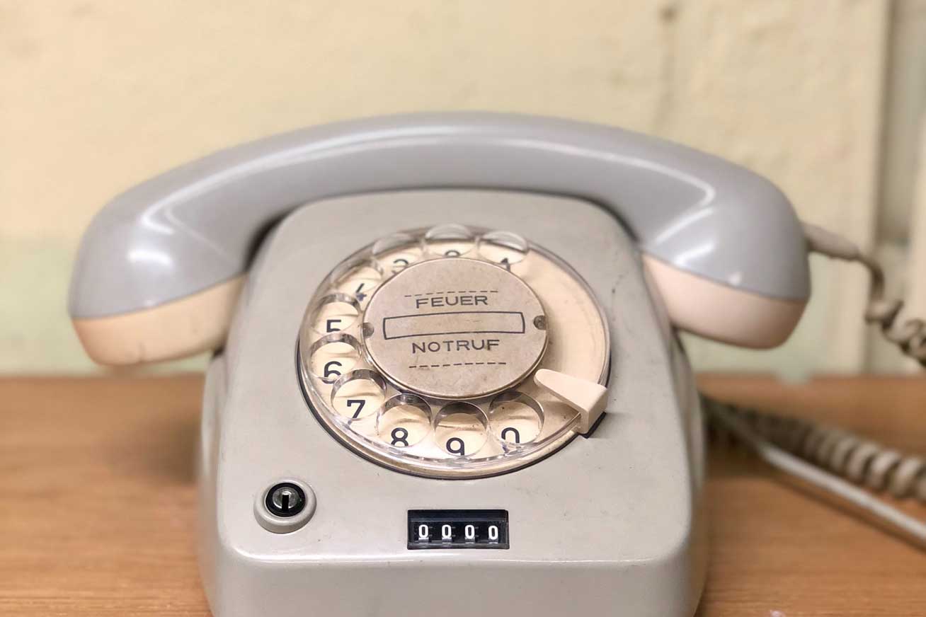 Old phone sitting on desk