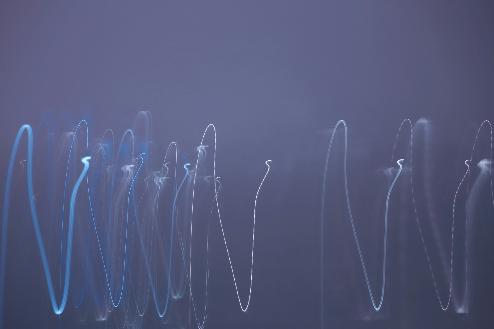a group of blue lights that are next to each other