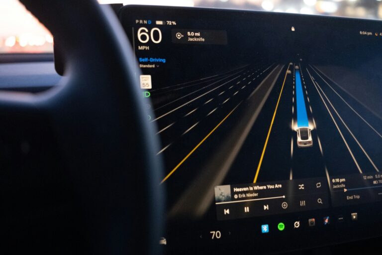 Car dashboard displaying a connected driving interface, used as the featured image for an article about the GM CCPA settlement