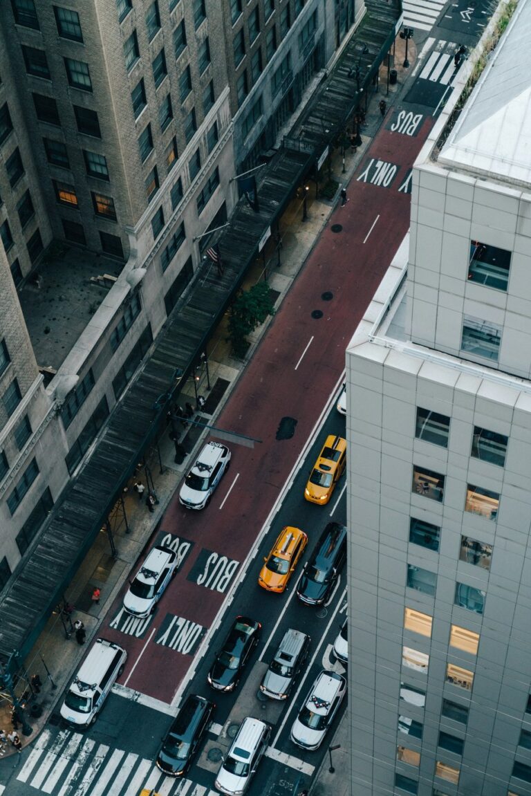 Aerial view of busy urban traffic illustrating automated mobility decisions